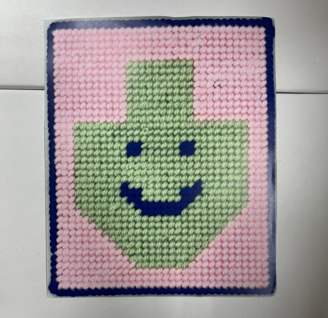 NEEDLE-POINT: DREIDEL